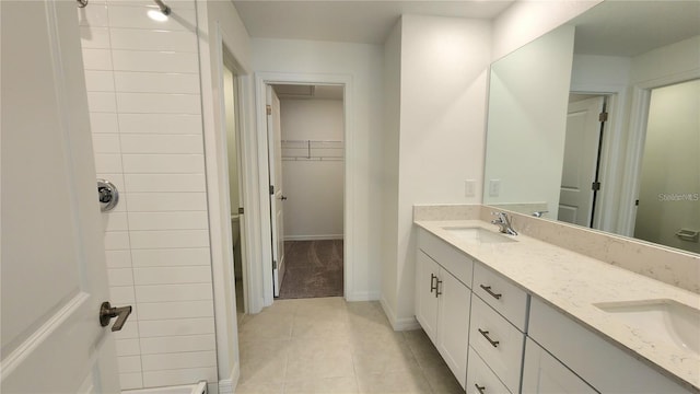 bathroom featuring vanity and tile patterned flooring