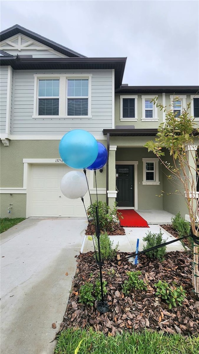 view of front of home with a garage