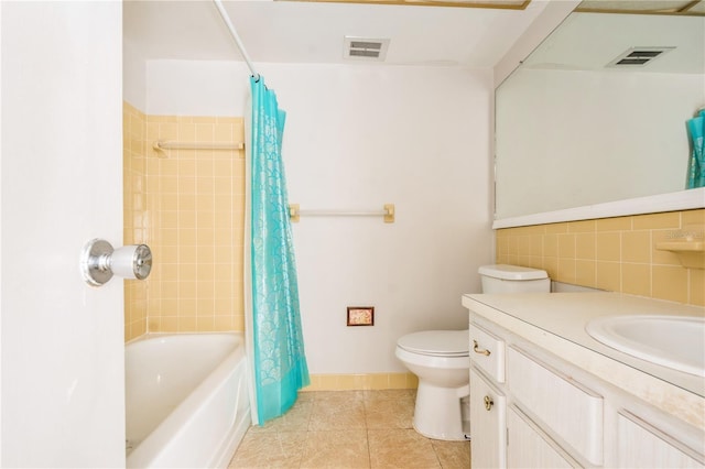 full bathroom with vanity, shower / bath combination with curtain, and toilet