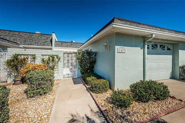 view of property exterior featuring a garage