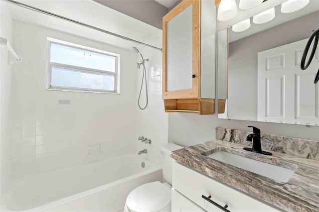 full bathroom featuring vanity, toilet, and shower / washtub combination