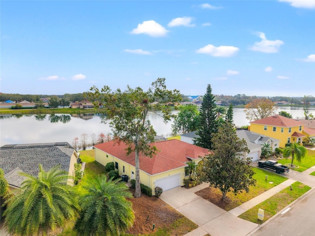 bird's eye view with a water view