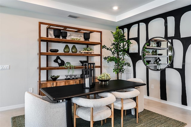 dining space featuring tile patterned floors