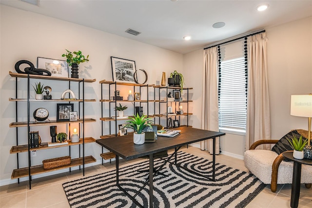 home office featuring light tile patterned flooring