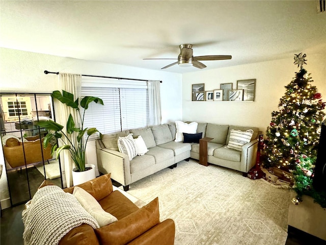 living room featuring ceiling fan