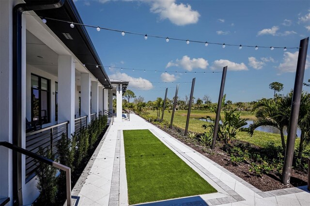 view of yard with a water view