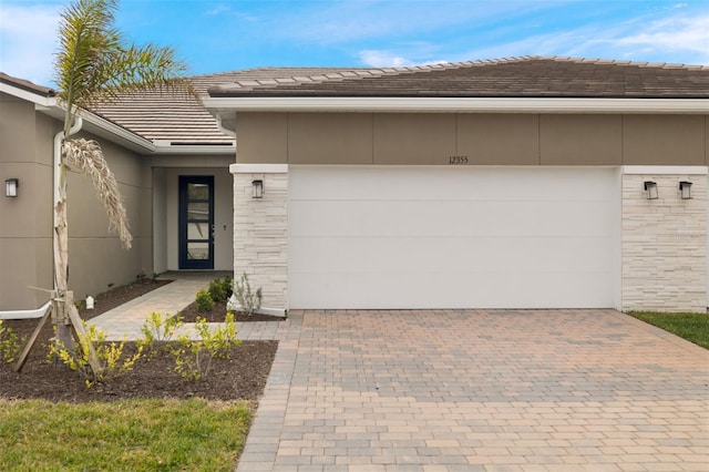 property entrance with a garage