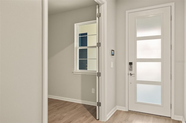 doorway featuring light hardwood / wood-style floors