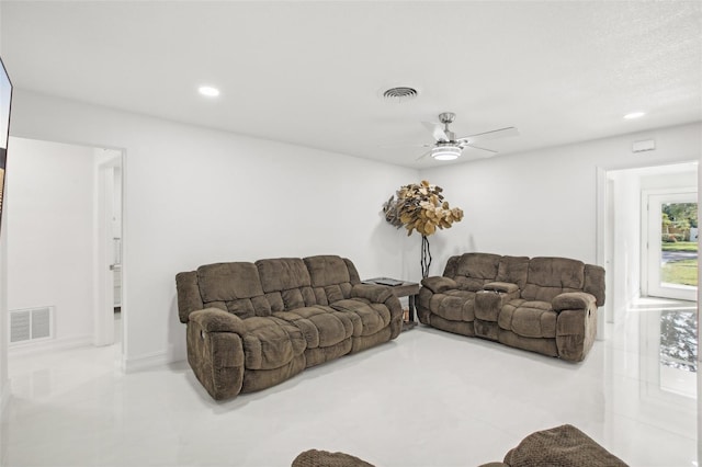 living room featuring ceiling fan