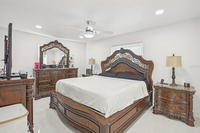 carpeted bedroom with ceiling fan