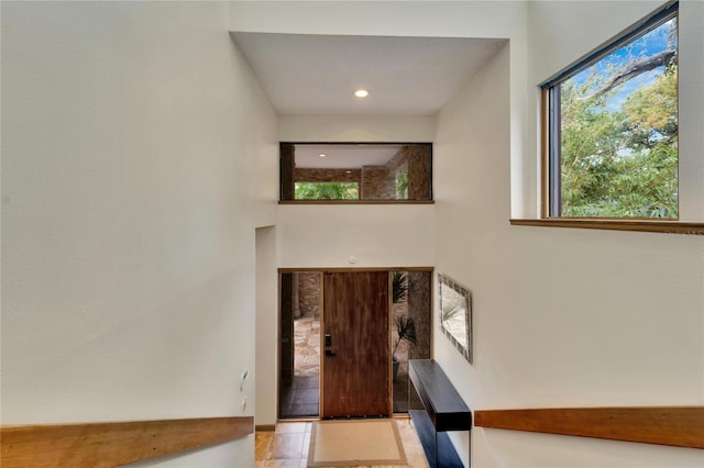 entrance foyer featuring light tile patterned flooring