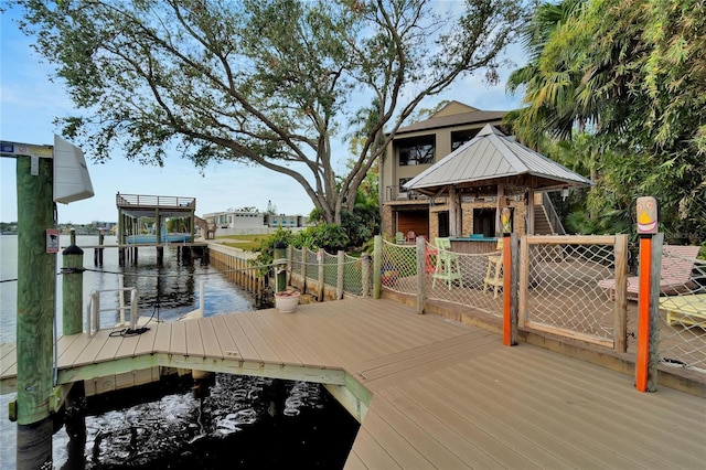 dock area with a water view