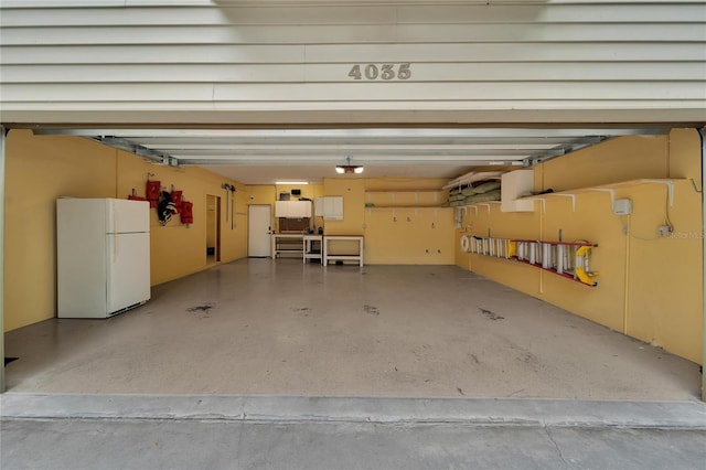 garage with white fridge