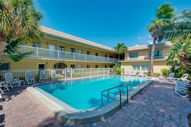 view of pool featuring a patio area