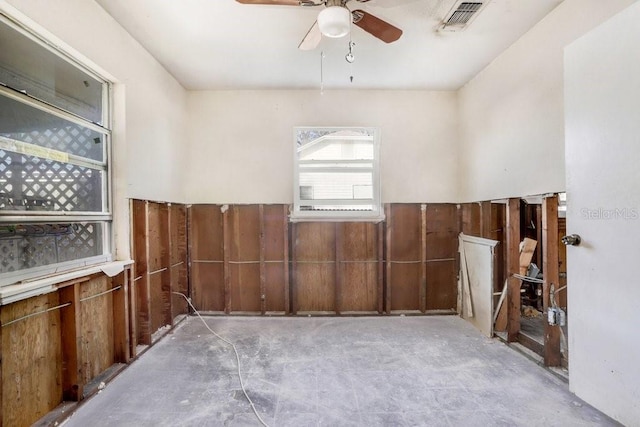 unfurnished room featuring ceiling fan