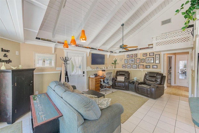 living room featuring beamed ceiling, ceiling fan, high vaulted ceiling, and light hardwood / wood-style flooring