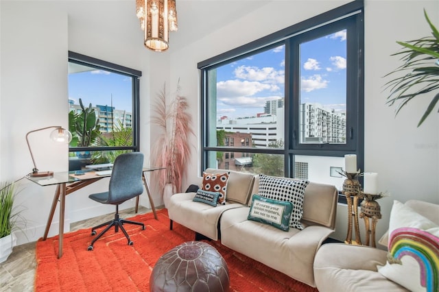 home office featuring a notable chandelier