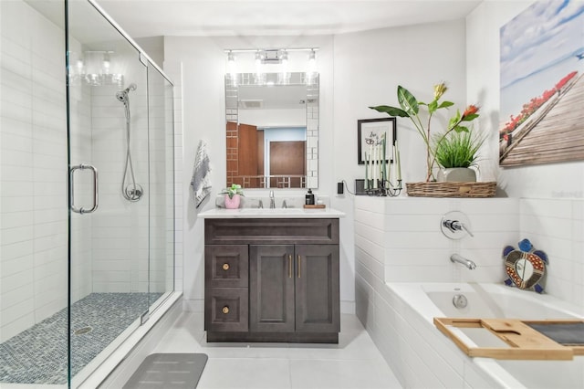 bathroom with vanity, tile patterned floors, and independent shower and bath