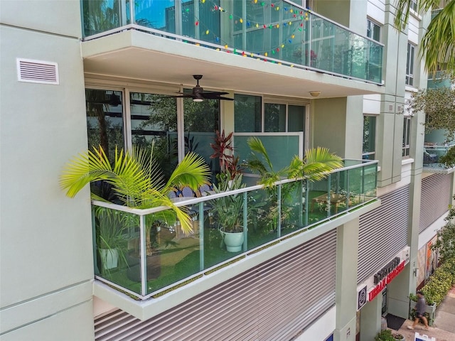 view of property exterior featuring ceiling fan