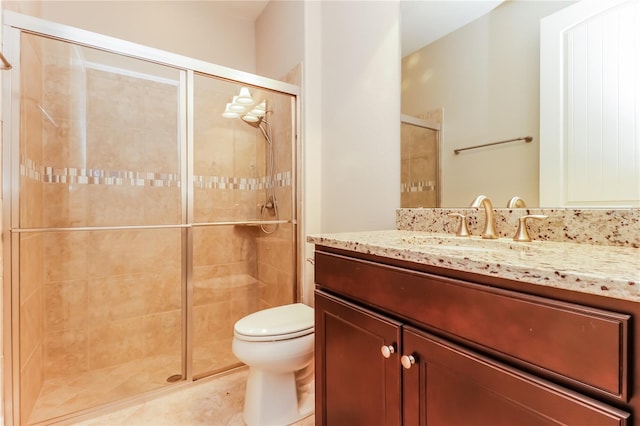 bathroom featuring walk in shower, tile patterned floors, vanity, and toilet