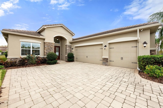 view of front of property featuring a garage