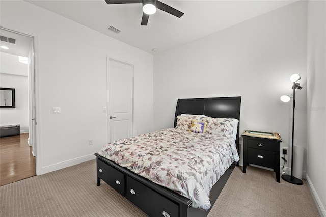 carpeted bedroom featuring ceiling fan