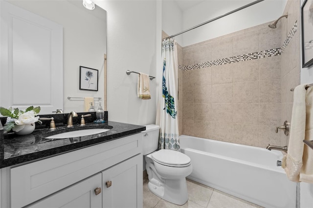 full bathroom featuring tile patterned flooring, shower / bath combination with curtain, vanity, and toilet