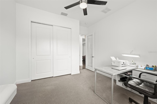 home office featuring carpet flooring and ceiling fan