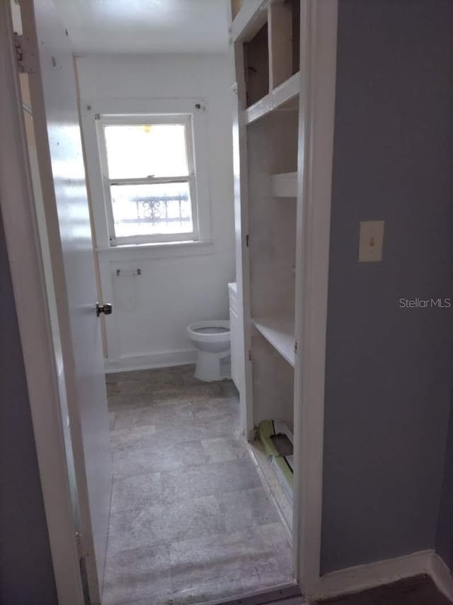 bathroom featuring toilet