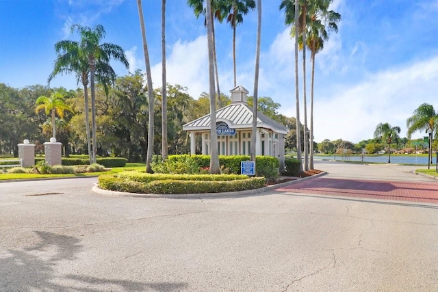 surrounding community featuring a water view