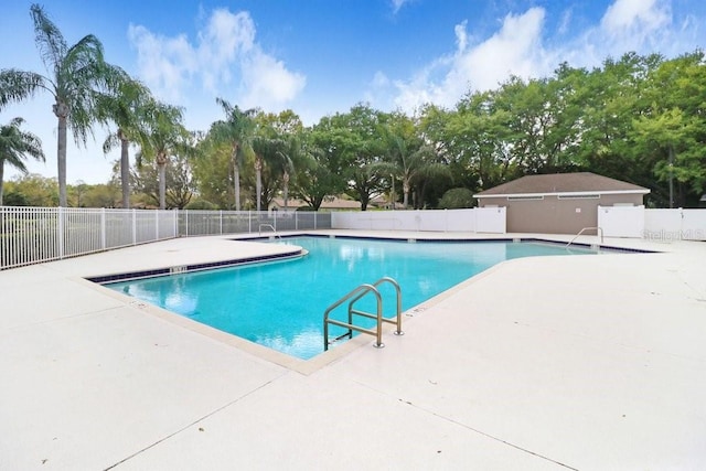 view of swimming pool featuring a patio