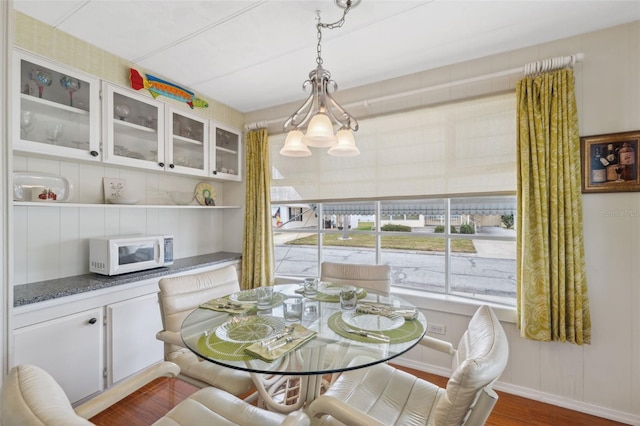 dining room featuring dark wood-type flooring