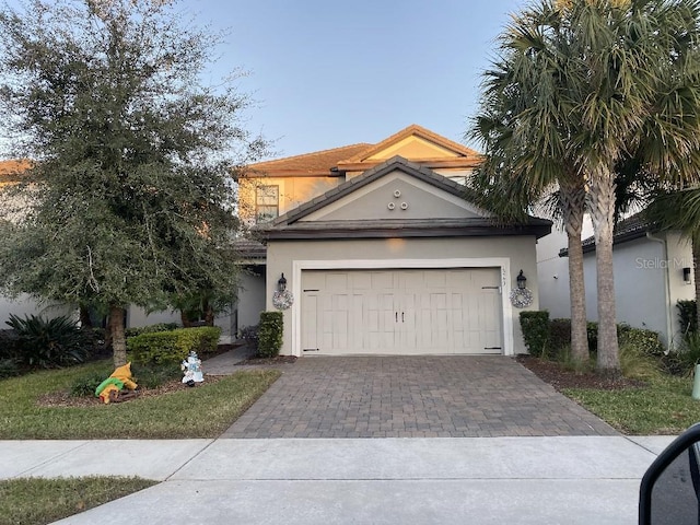 view of front of home with a garage