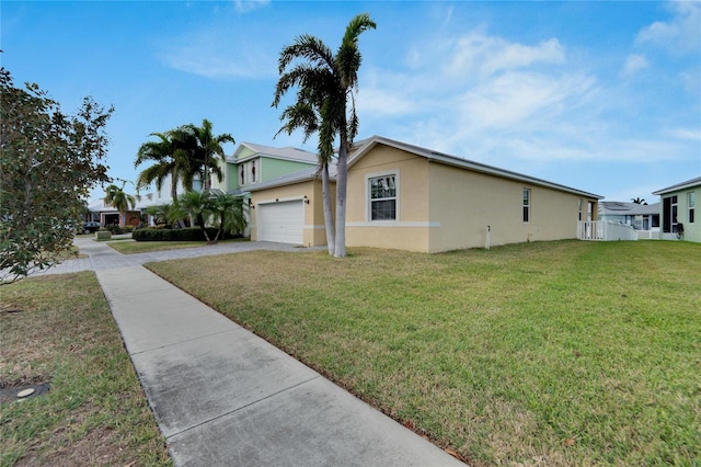 view of property exterior with a lawn and a garage