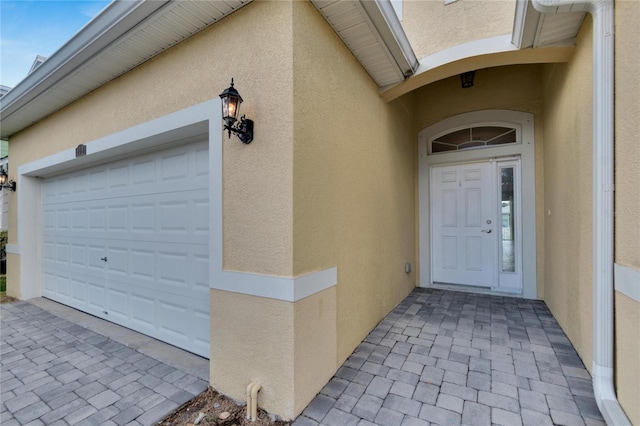 entrance to property with a garage