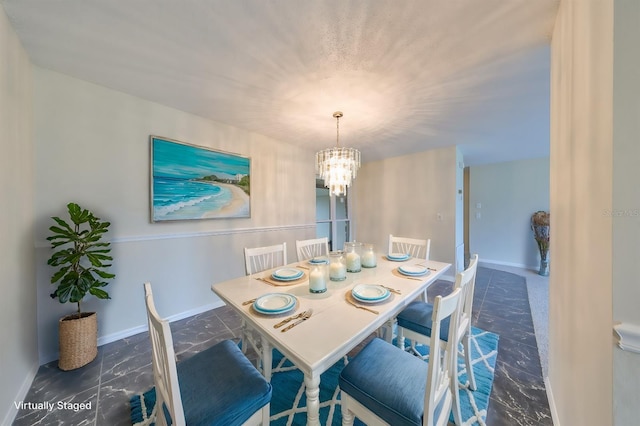 dining room with a chandelier