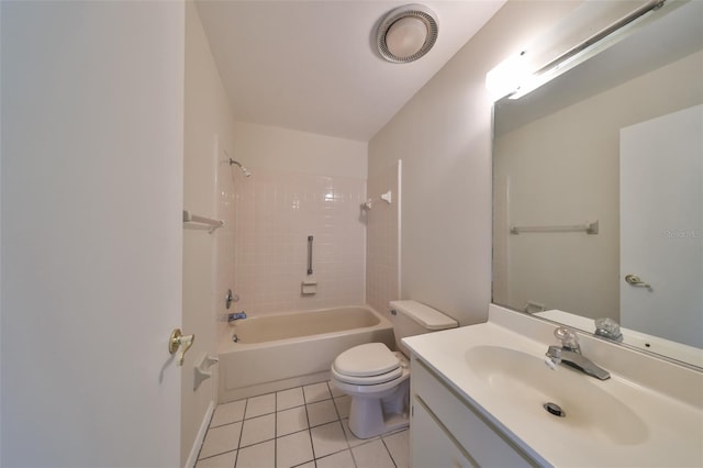 full bathroom featuring tile patterned floors, toilet, vanity, and tiled shower / bath