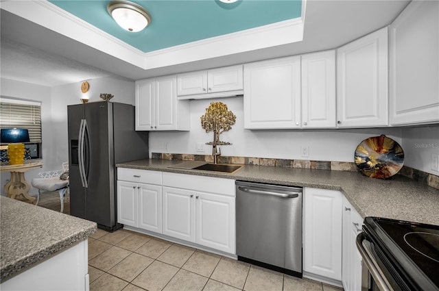 kitchen featuring stainless steel appliances, sink, and white cabinets