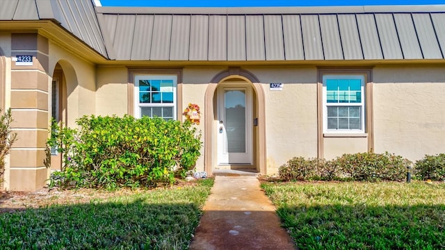 4235 Stratford Dr, New Port Richey, FL 34652 - doorway to property with a lawn