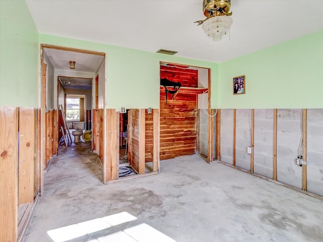 interior space featuring concrete flooring