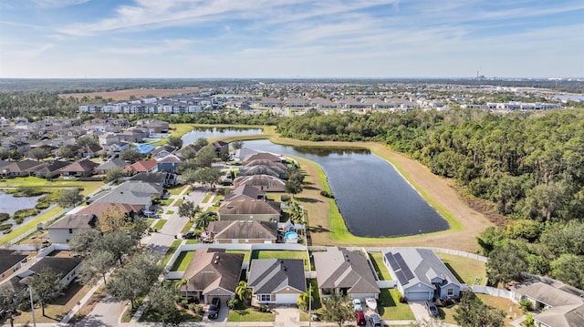 drone / aerial view with a water view