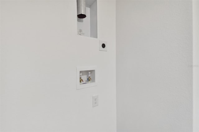 clothes washing area featuring electric dryer hookup and washer hookup