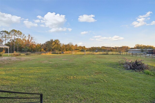 view of yard featuring a rural view