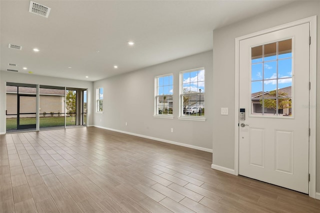 entrance foyer featuring a wealth of natural light