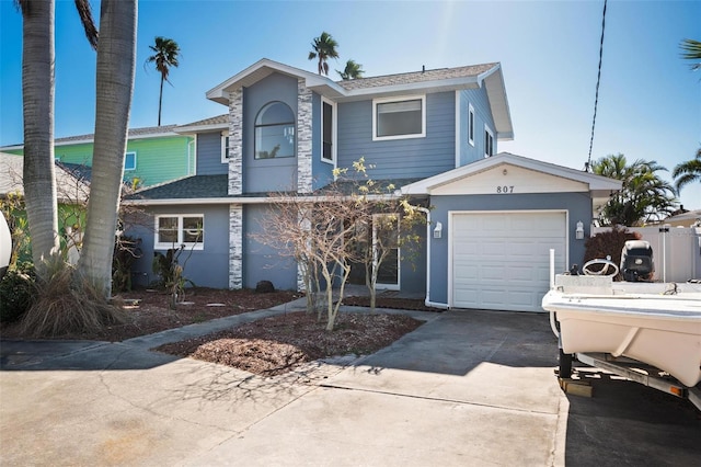 view of front of property featuring a garage