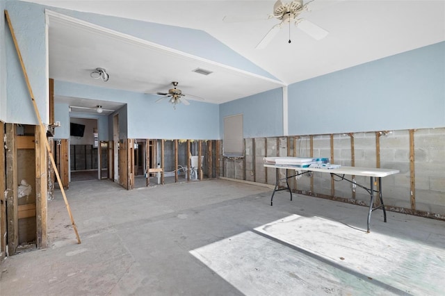 miscellaneous room with ceiling fan and vaulted ceiling