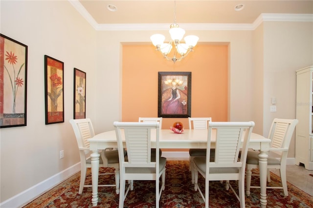 dining room with crown molding and an inviting chandelier