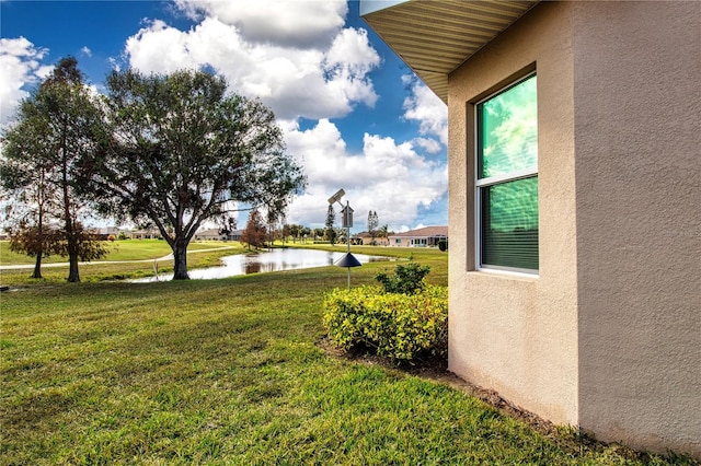 view of yard featuring a water view