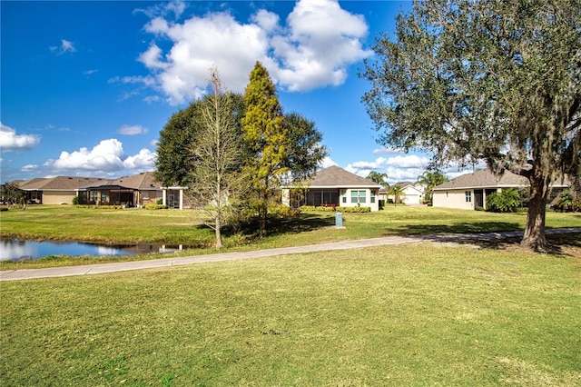 view of yard with a water view