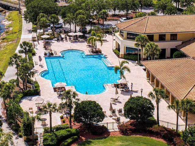 view of swimming pool with a patio area